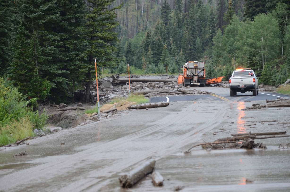 A 10-mile stretch of state Route 31 in Huntington Canyon remained closed on Tuesday, Aug. 5, 2014, after severe rainstorms created debris flows that washed onto the highway.