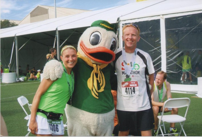 Kim and Christian Cowart get a shot with "Puddles" the Oregon Duck.