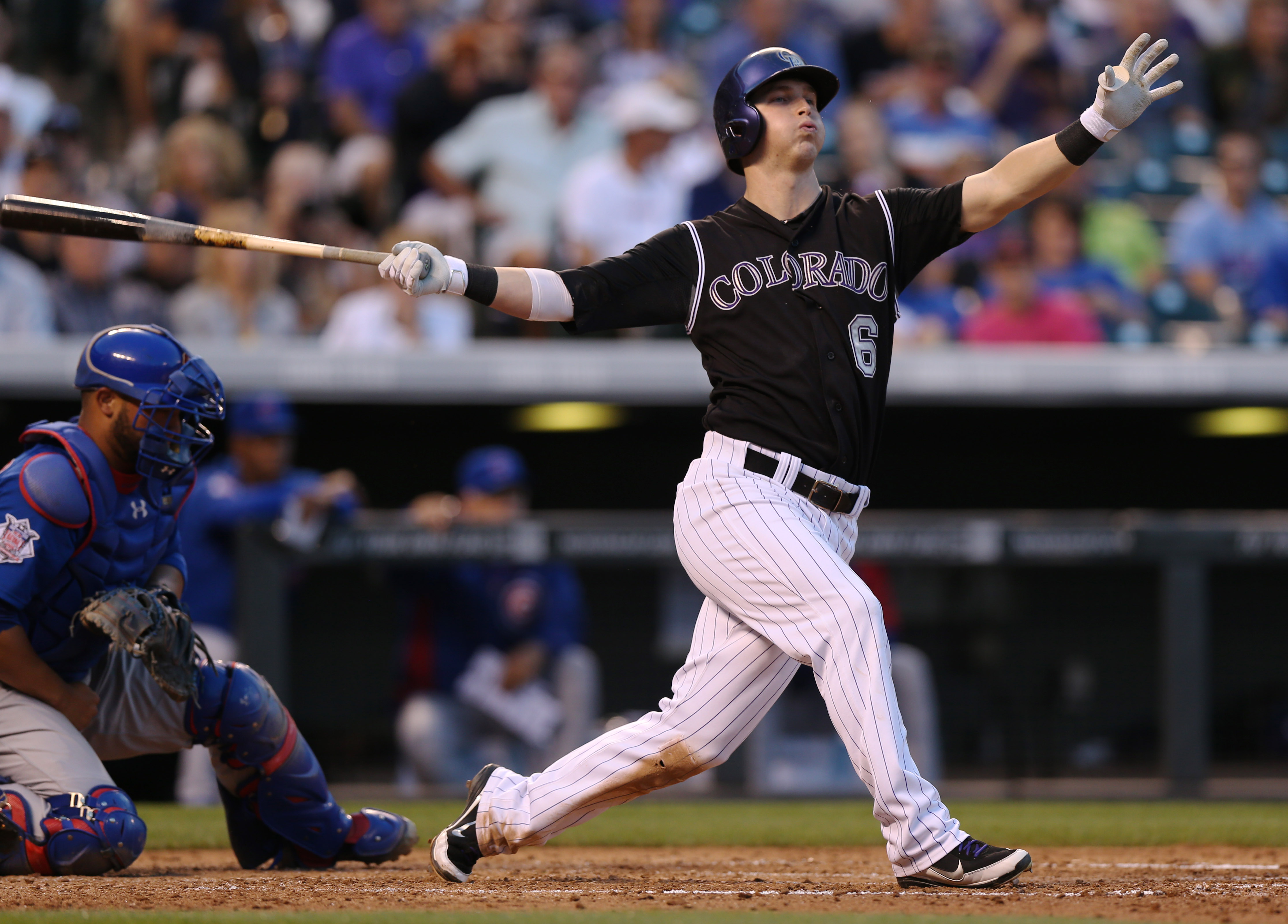 Gonzalez homers as Rockies rout Cubs, 13-4.