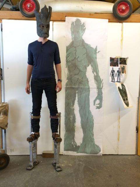 Josh Hunt stands on drywall stilts in comparison to a life-size picture of the virtual Groot character in "Guardians of the Galaxy." (Photo: JD Winters, JPro Studios)
