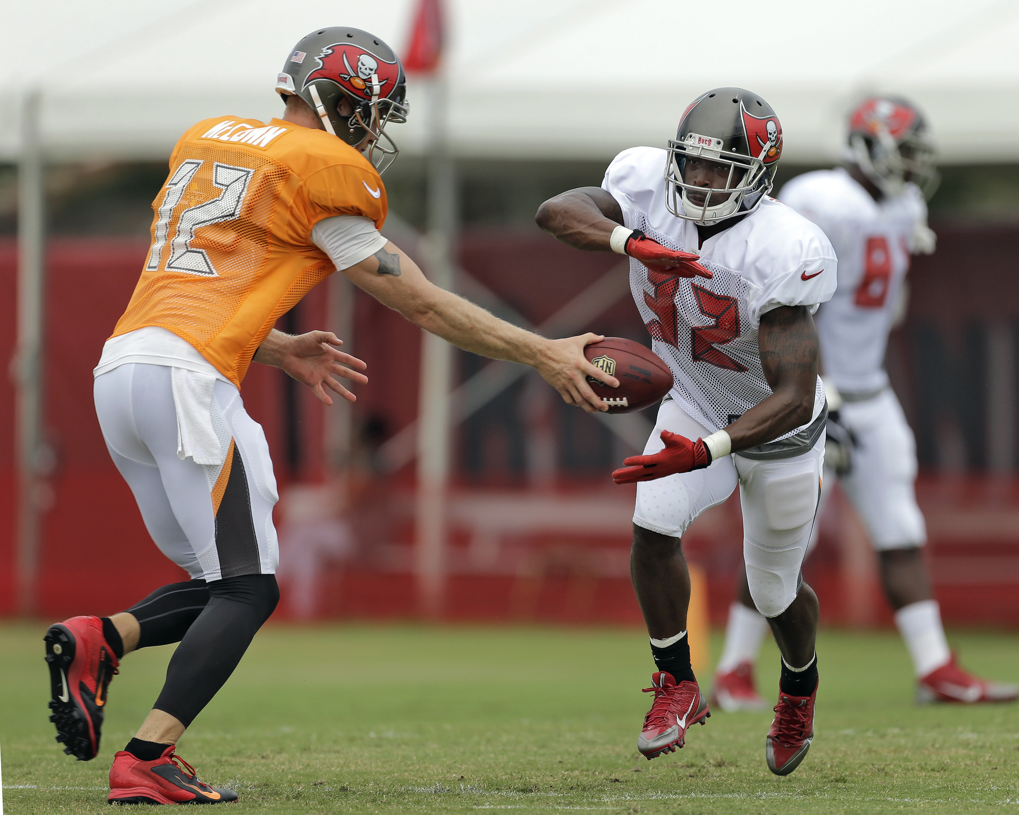 Track star Demps trying to make transition to NFL