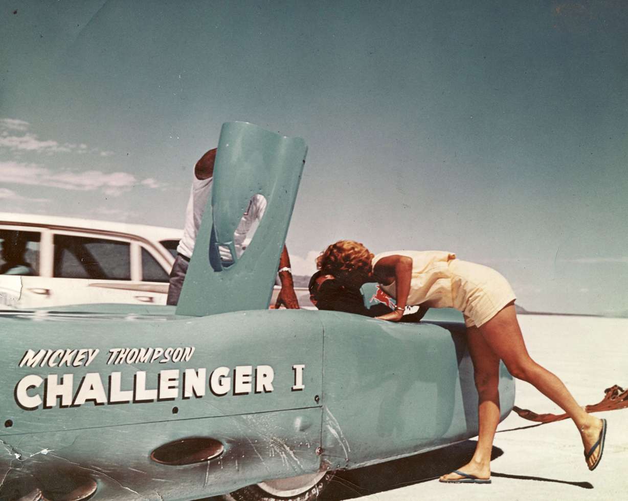 "Speed King" Mickey Thompson gets a good-luck smooch from his wife, Judy, before going 406.6 mph at the Bonneville Salt Flats in 1960.