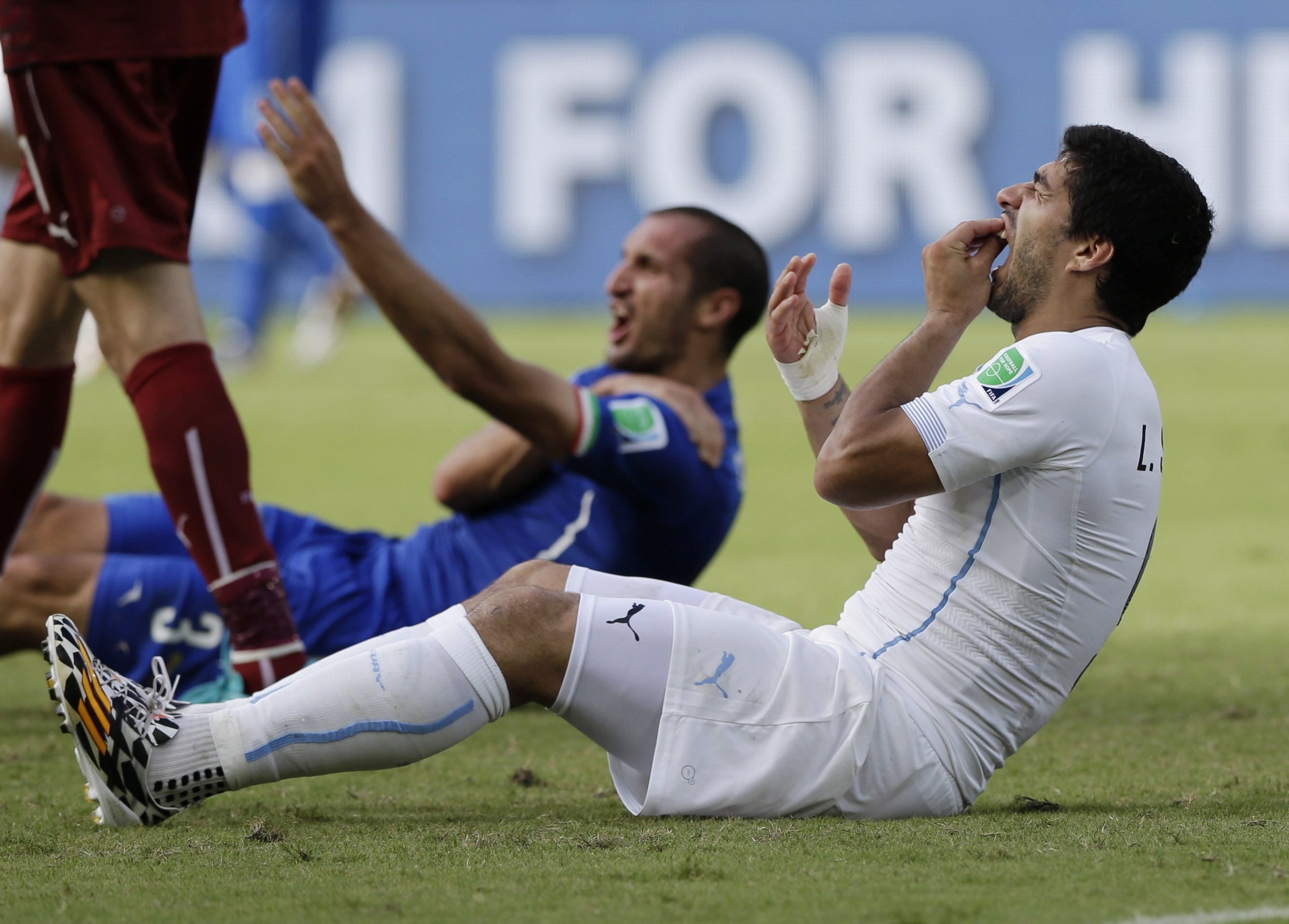 Suarez appeals FIFA ban, bite verdict next week