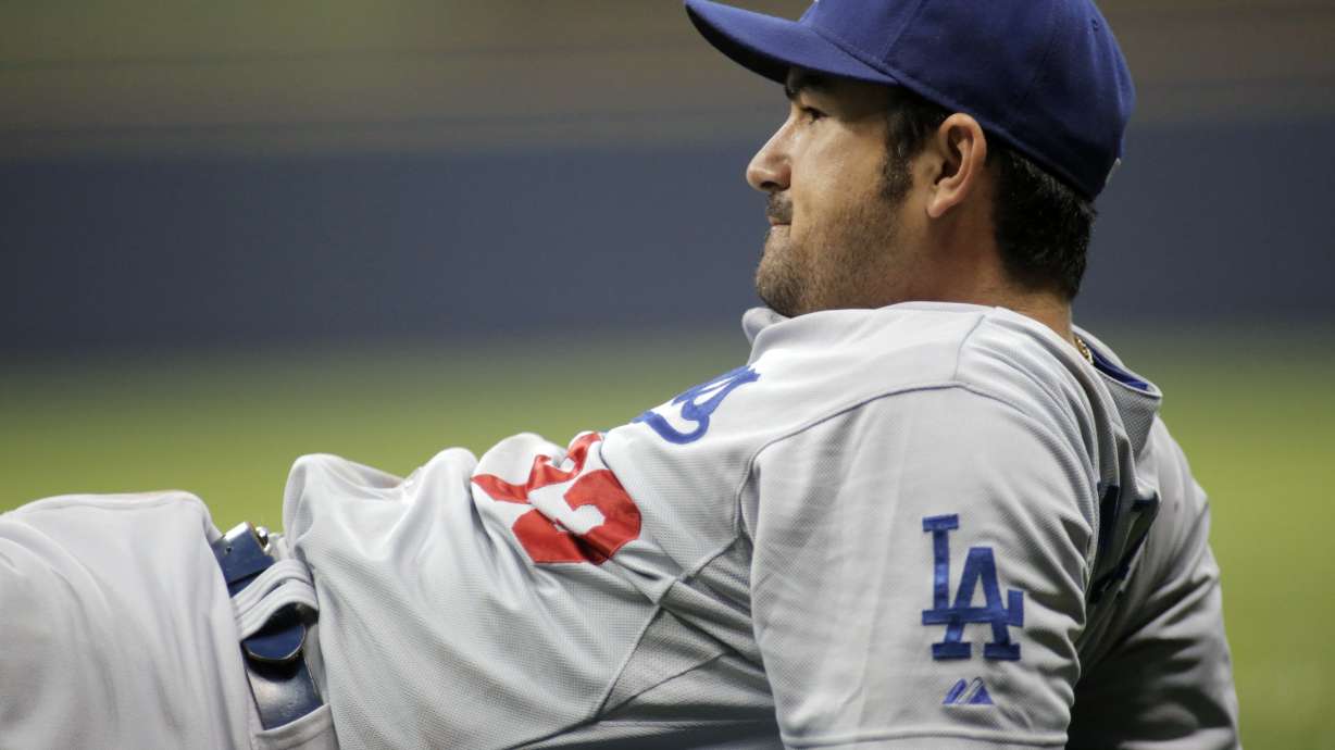 Dodgers lose 9-3 at Milwaukee