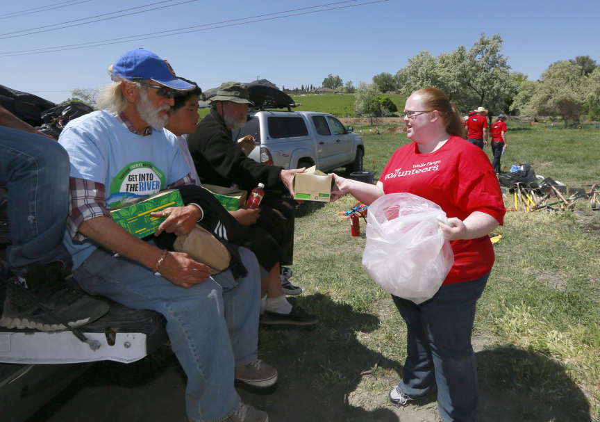 Volunteers feel better, less stressed, poll says