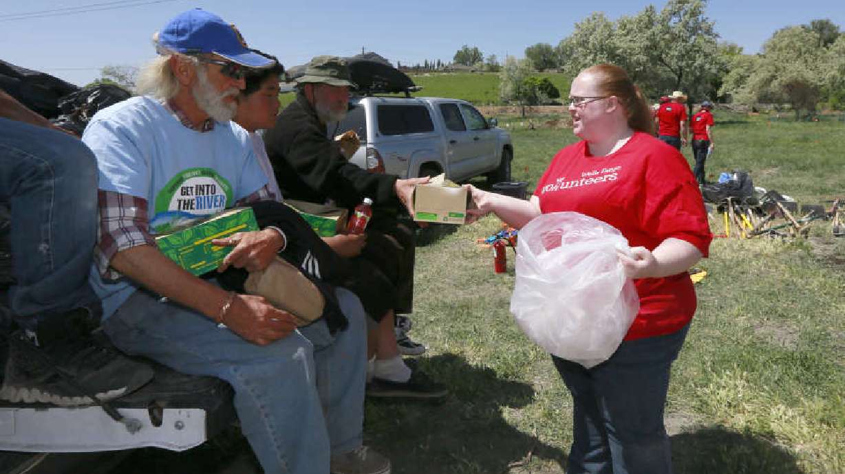 Volunteers feel better, less stressed, poll says