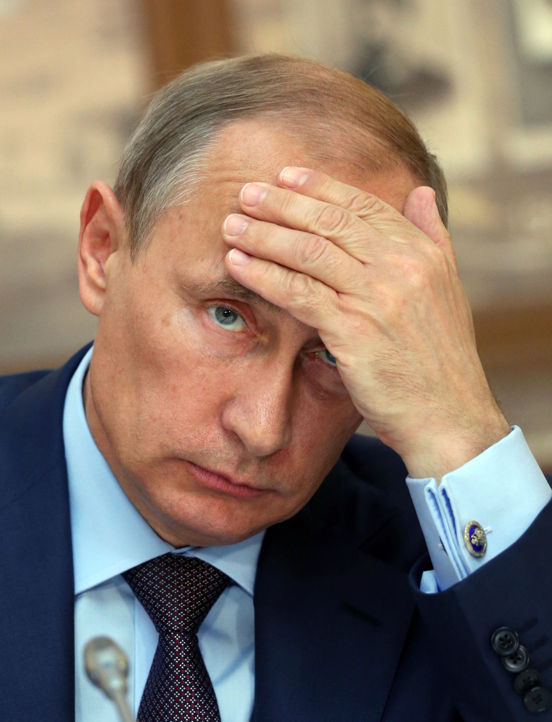 Putin tones down rhetoric on Ukraine