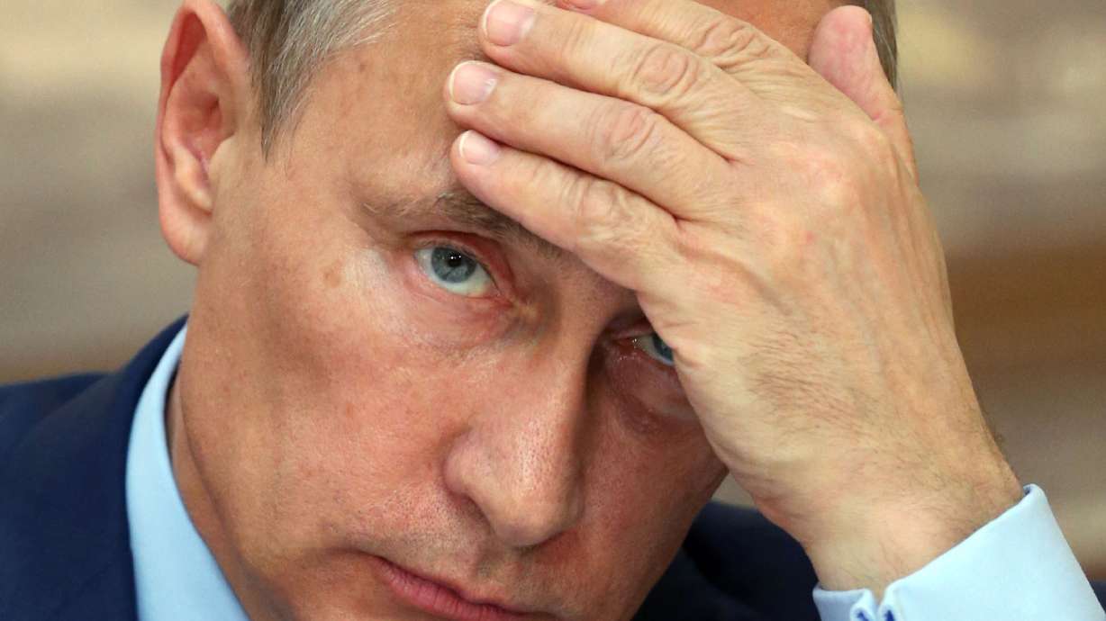 Putin tones down rhetoric on Ukraine