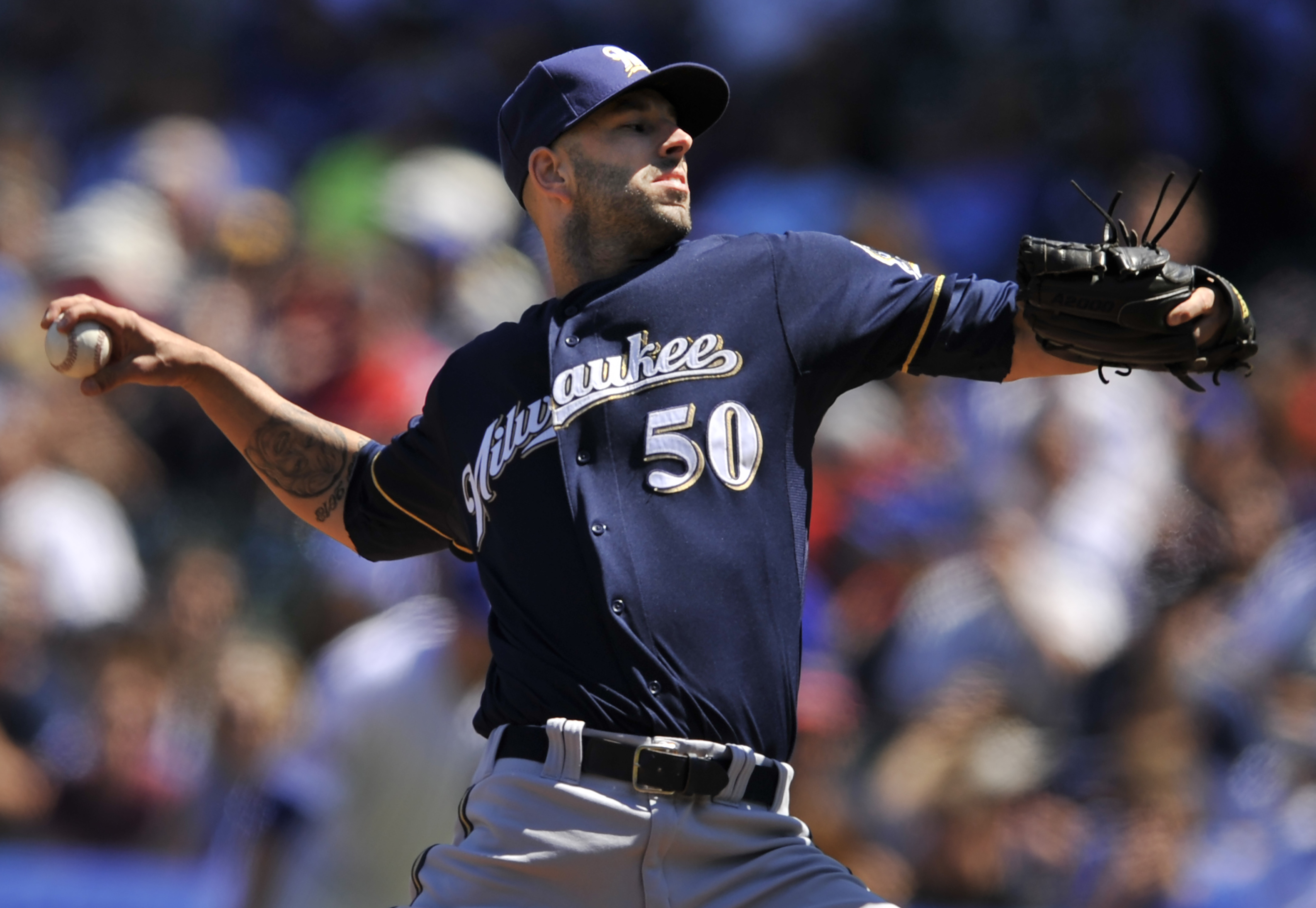 Fiers fans 14 in Brewers 6-2 win over Cubs