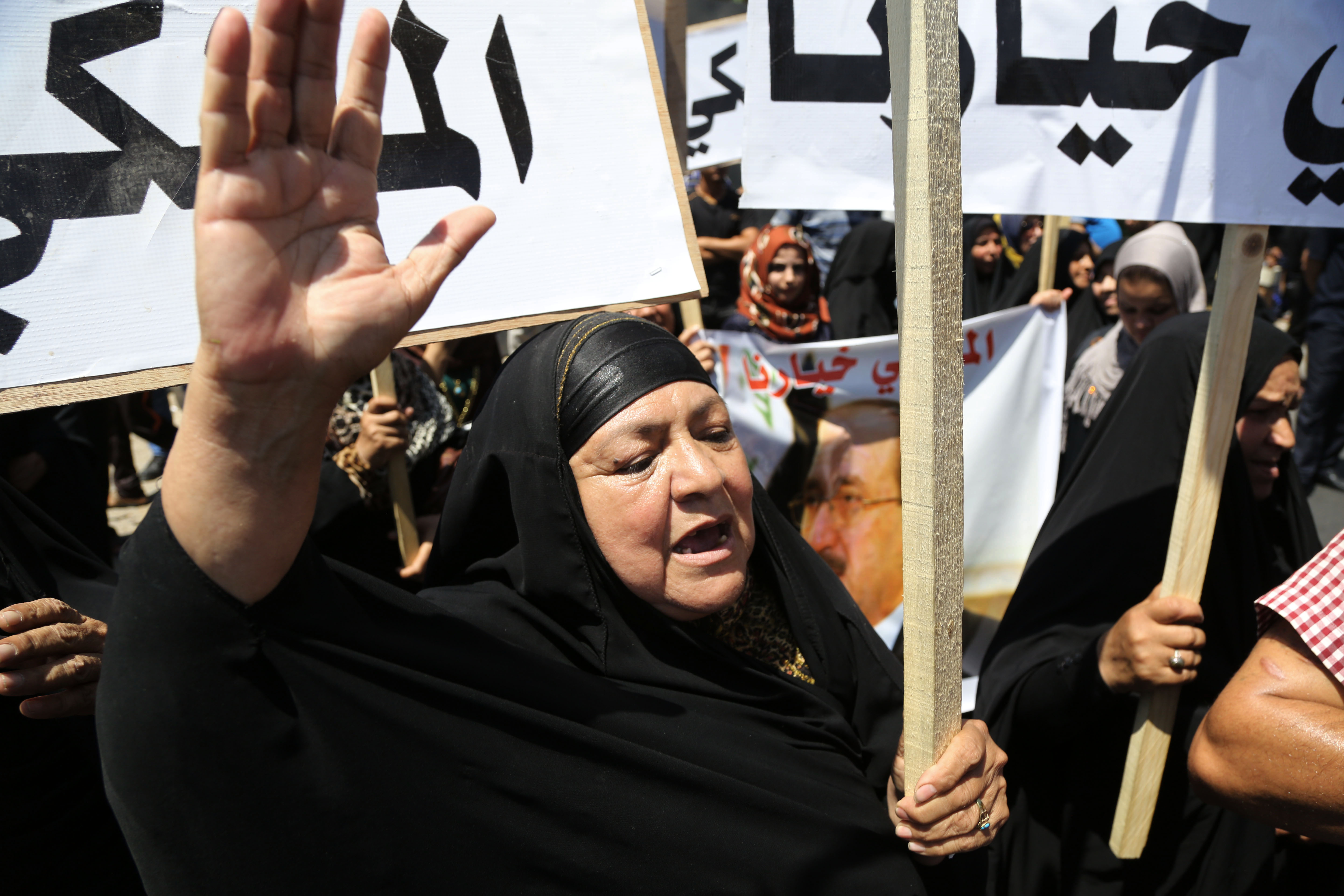 Iraqis welcome change of PM but challenges loom