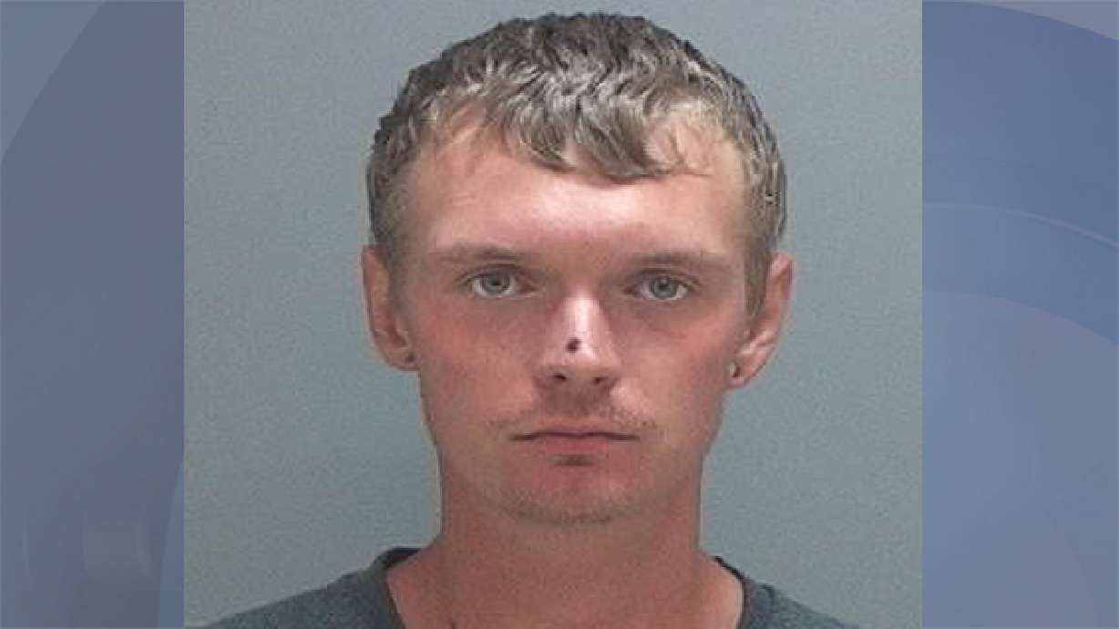 Man swings metal pipe at officers, asks them to shoot him, police say