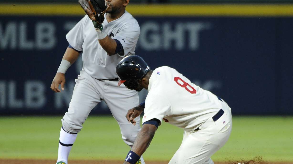 Johnson, Teheran, Braves hand A's 4th loss in row
