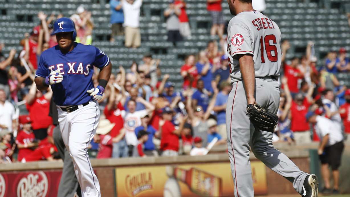 Huston nicked in 9th, Angels fall to Rangers