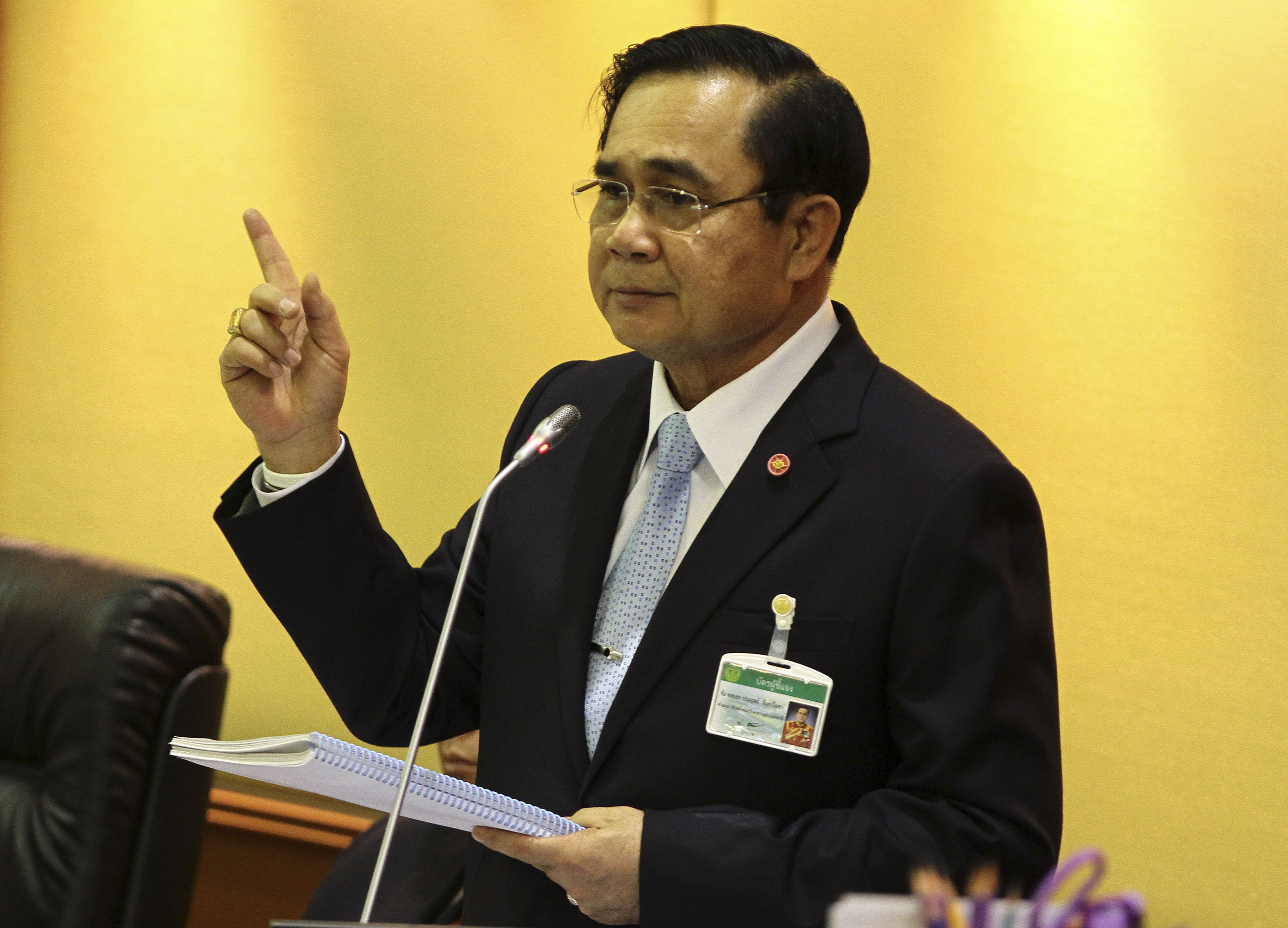 Thailand's military ruler dons a suit and tie