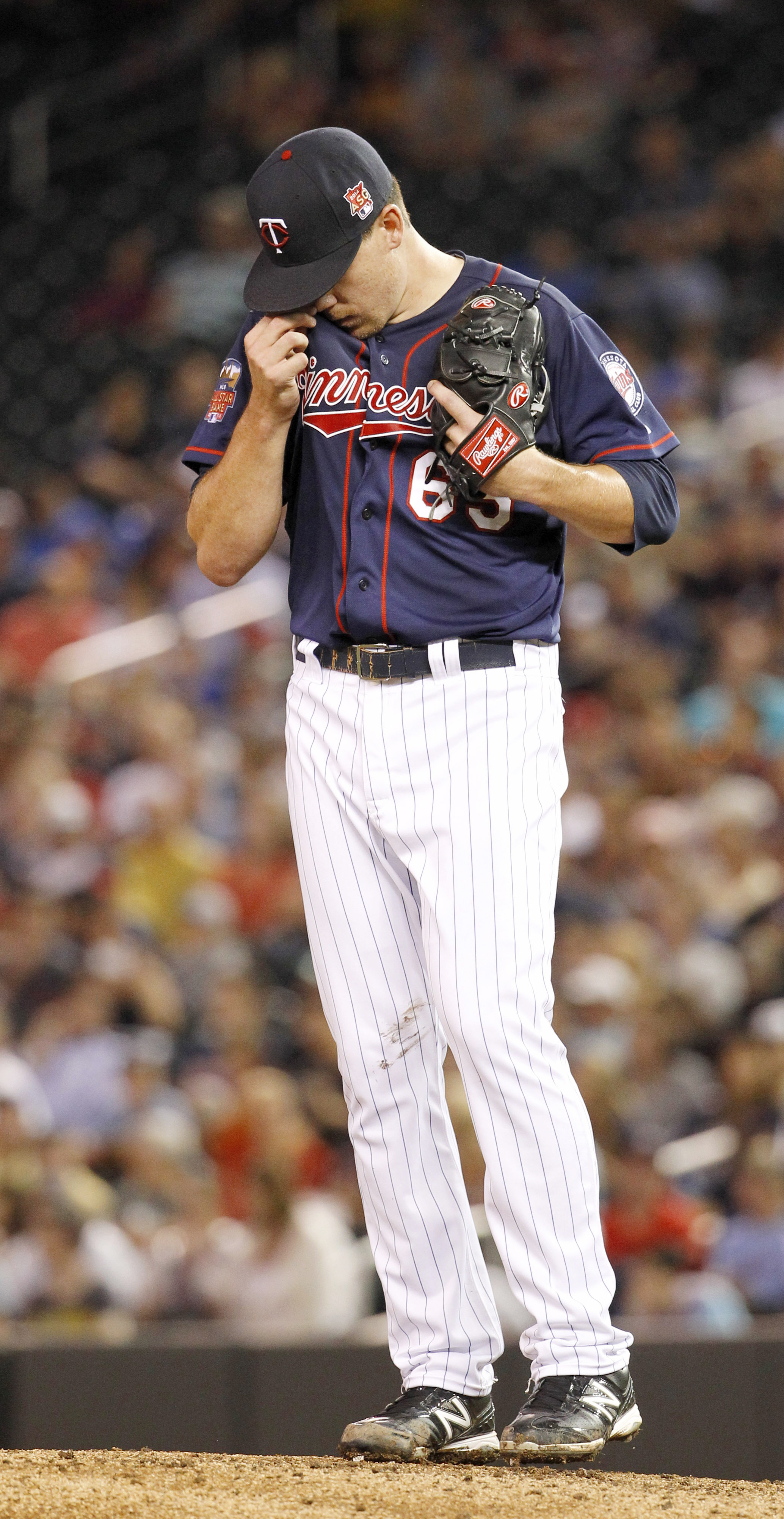 Walks hurt May again, Twins lose to Royals 6-4