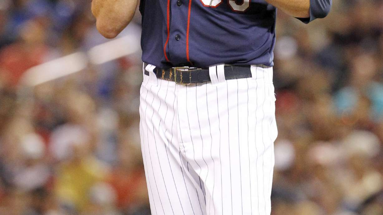 Walks hurt May again, Twins lose to Royals 6-4