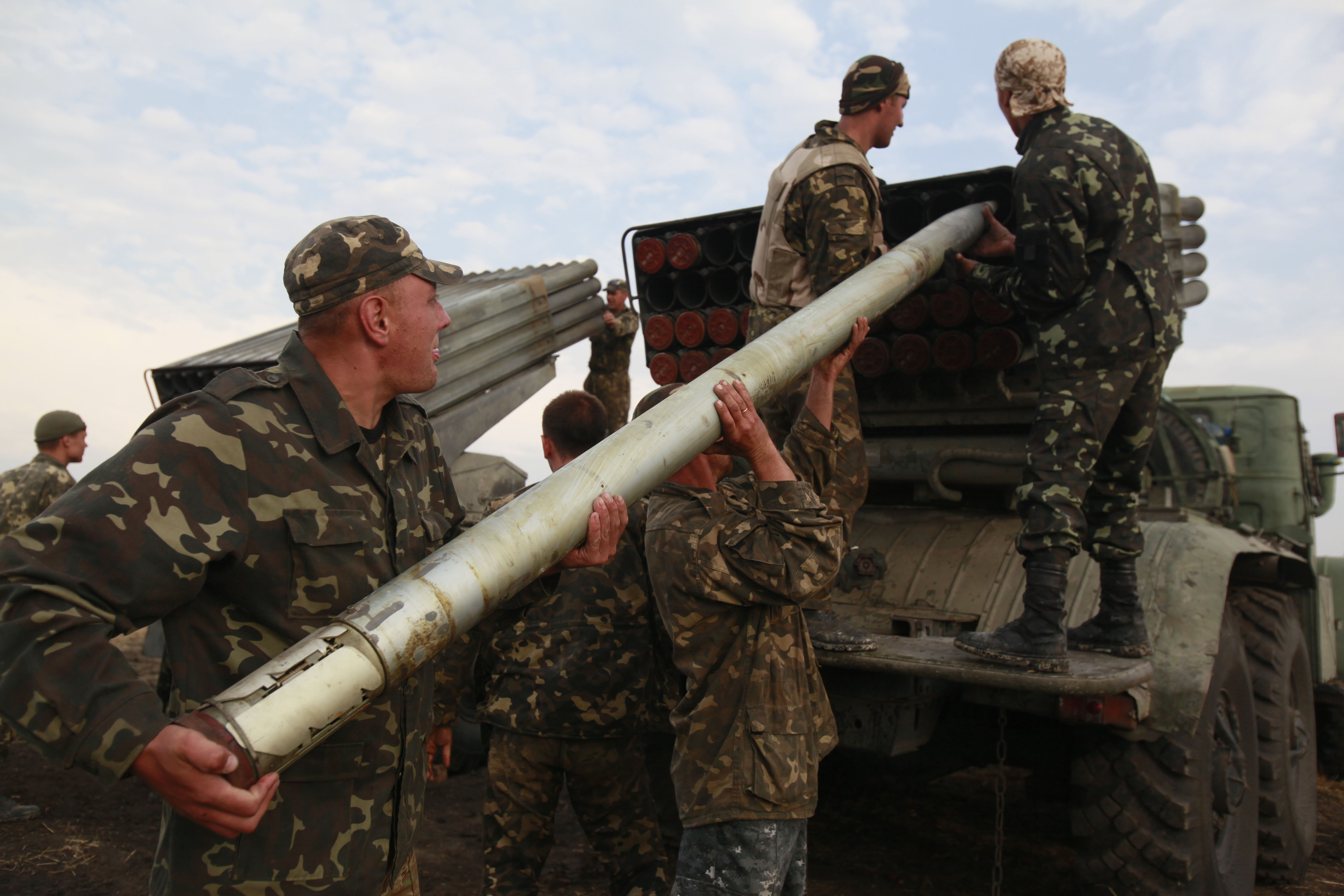 Ukrainian forces press attacks on rebel-held areas