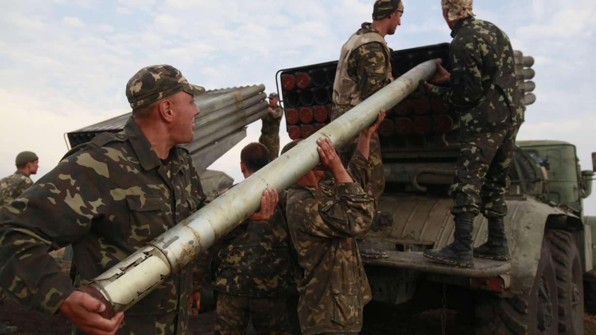 Ukrainian forces press attacks on rebel-held areas