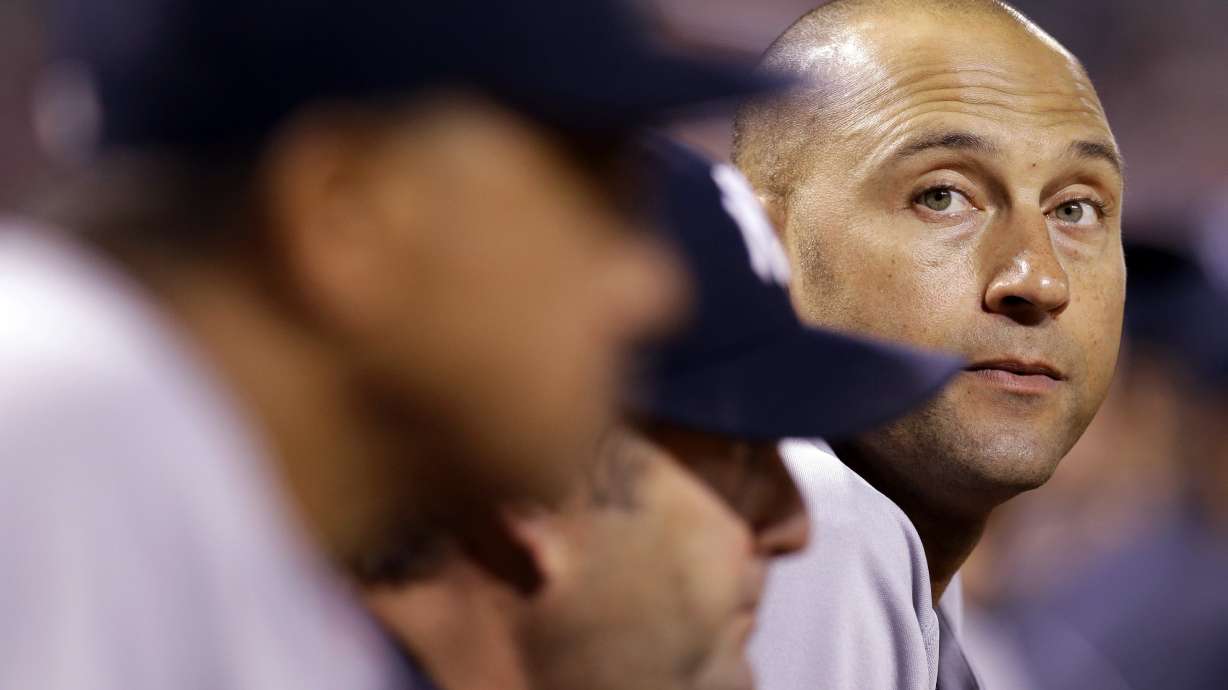 Jeter takes Ice Bucket Challenge, passes to Jordan