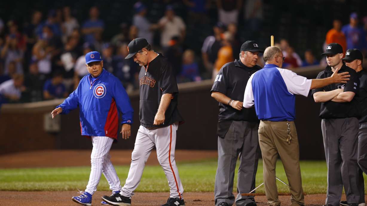 Cubs outlast Giants 2-0 in rain-shortened game