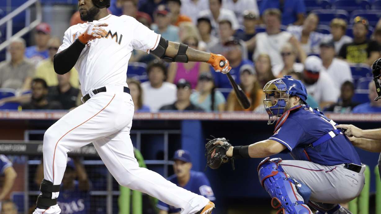 Marlins rally falls short, lose to Rangers 5-4