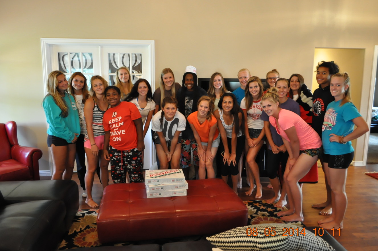 Cheerleaders embrace girl with special needs on team