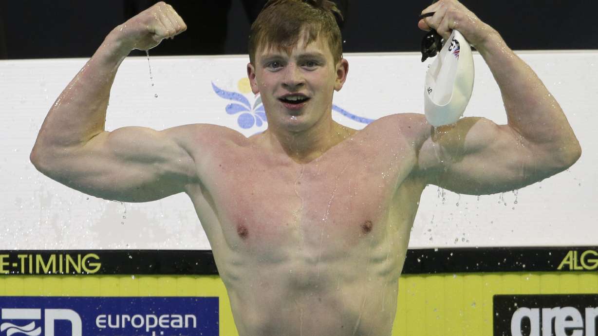 Adam Peaty breaks 50 breaststroke world record
