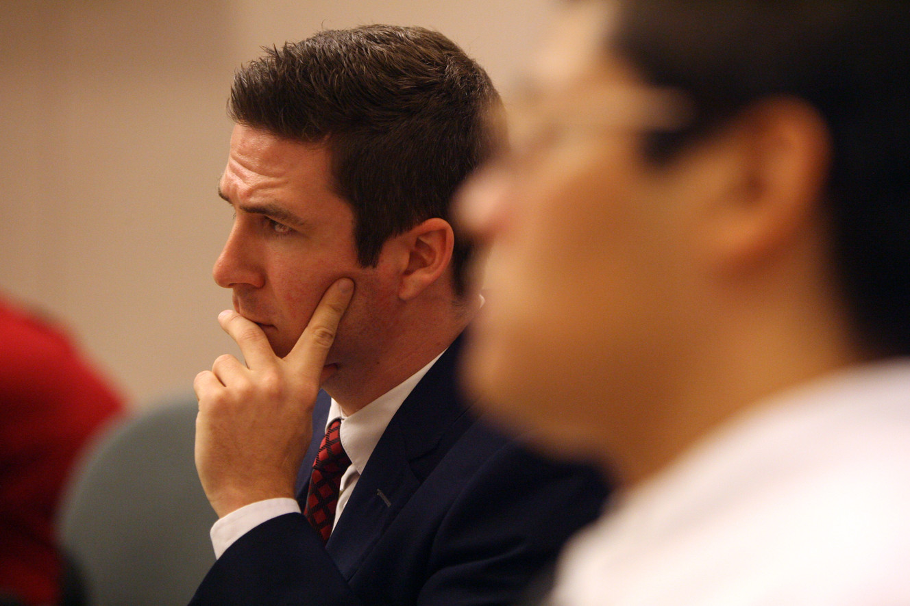 Defense attorney Ryan Holtan listens to jury instructions before presenting his closing argument in Vernal Friday, Aug. 22, 2014, in the murder trial for Jesse Anthony Saenz. Saenz, 24, is accused of killing 22-year-old Elvis Zachary Olsen on April 21, 2013, and stealing his car.