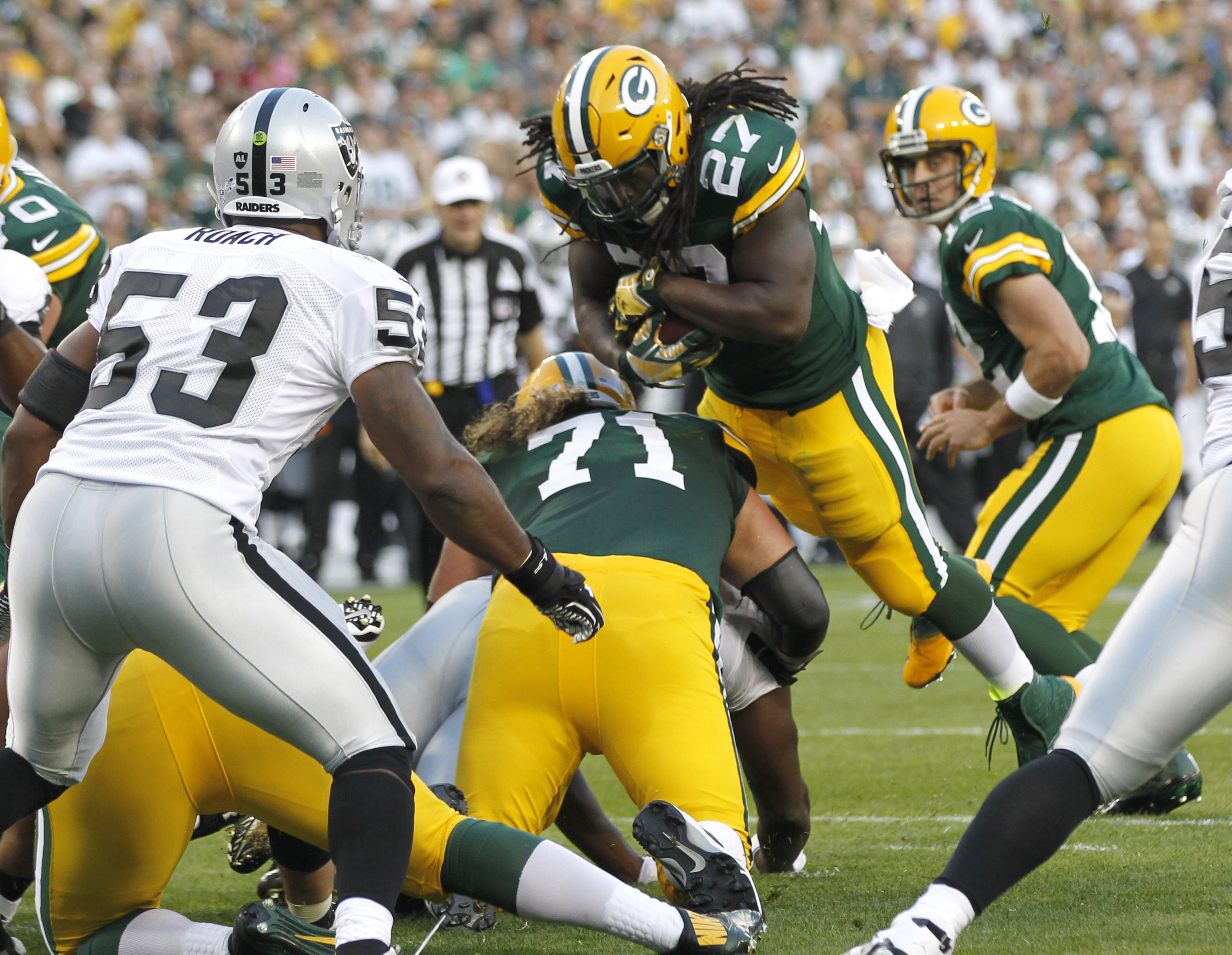 Rodgers has 2 TDs, Packers beat Raiders 31-21