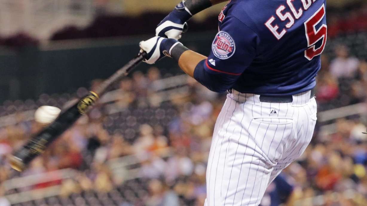 Escobar, Twins bat around twice, pound Tigers 20-6
