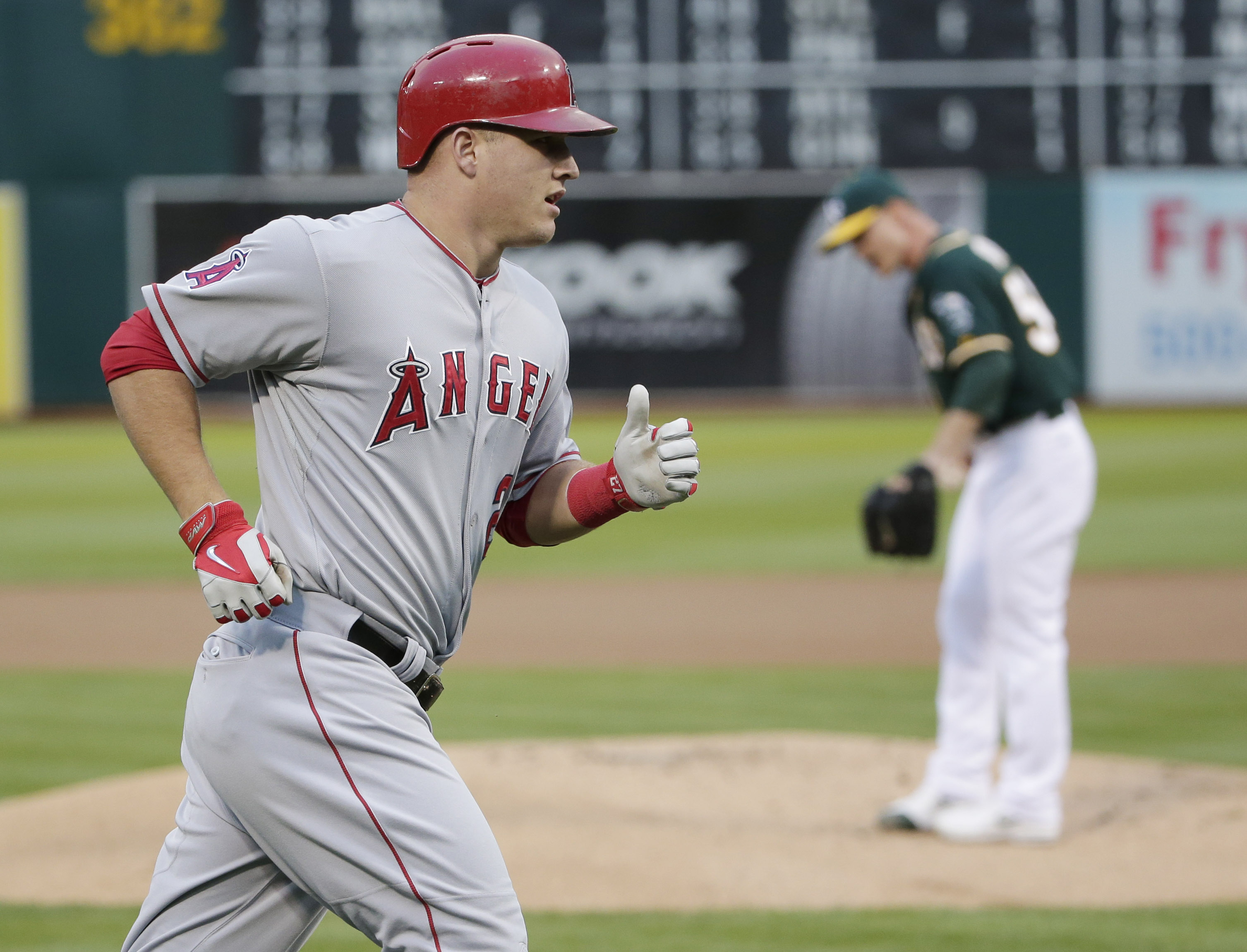 Trout, Hamilton homer in Angels' 5-3 loss to A's