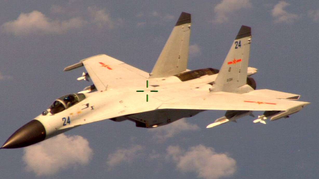 China defends intercepting US Navy plane