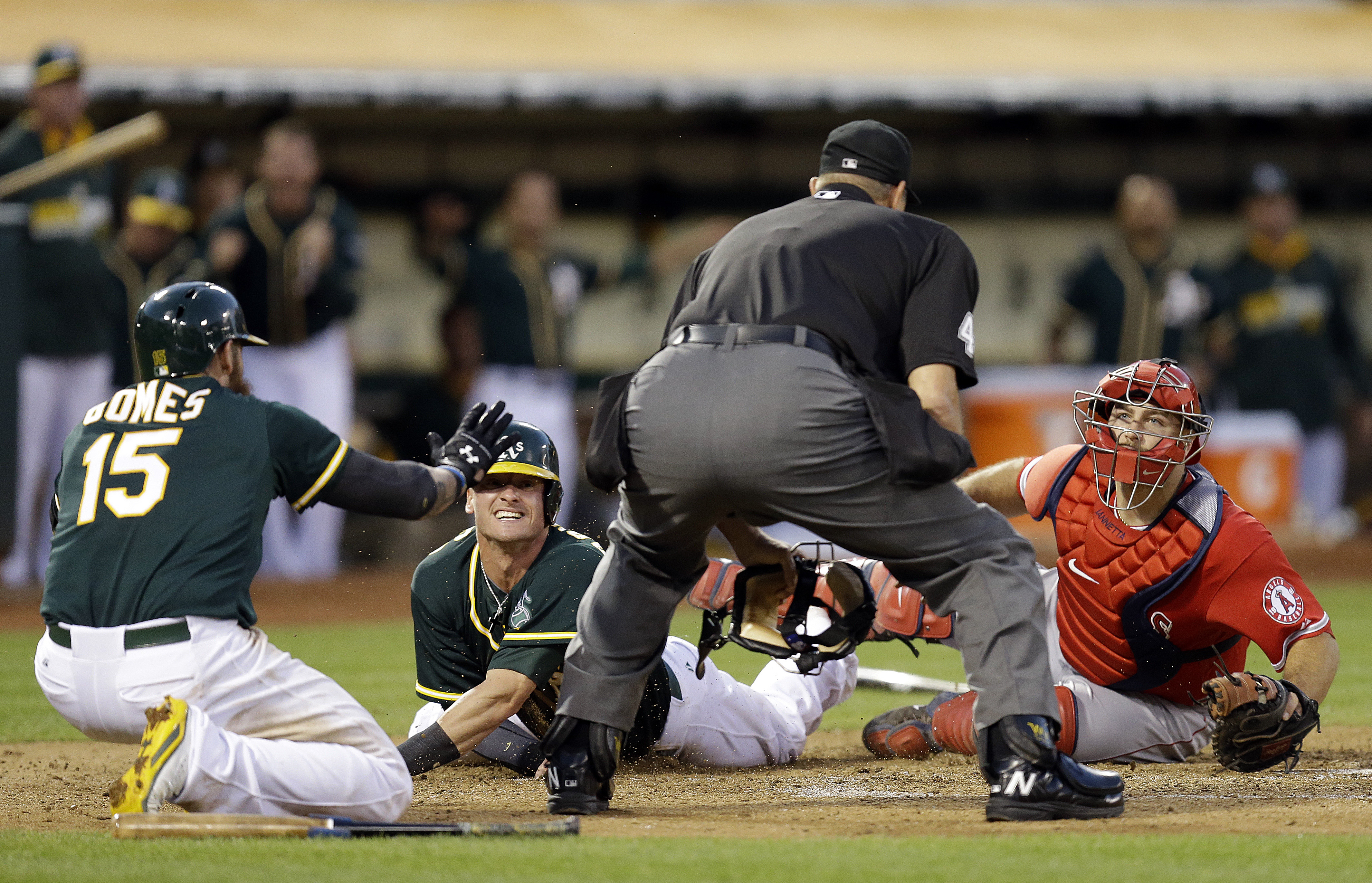 Crisp scores on wild pitch as A's beat Angels 2-1
