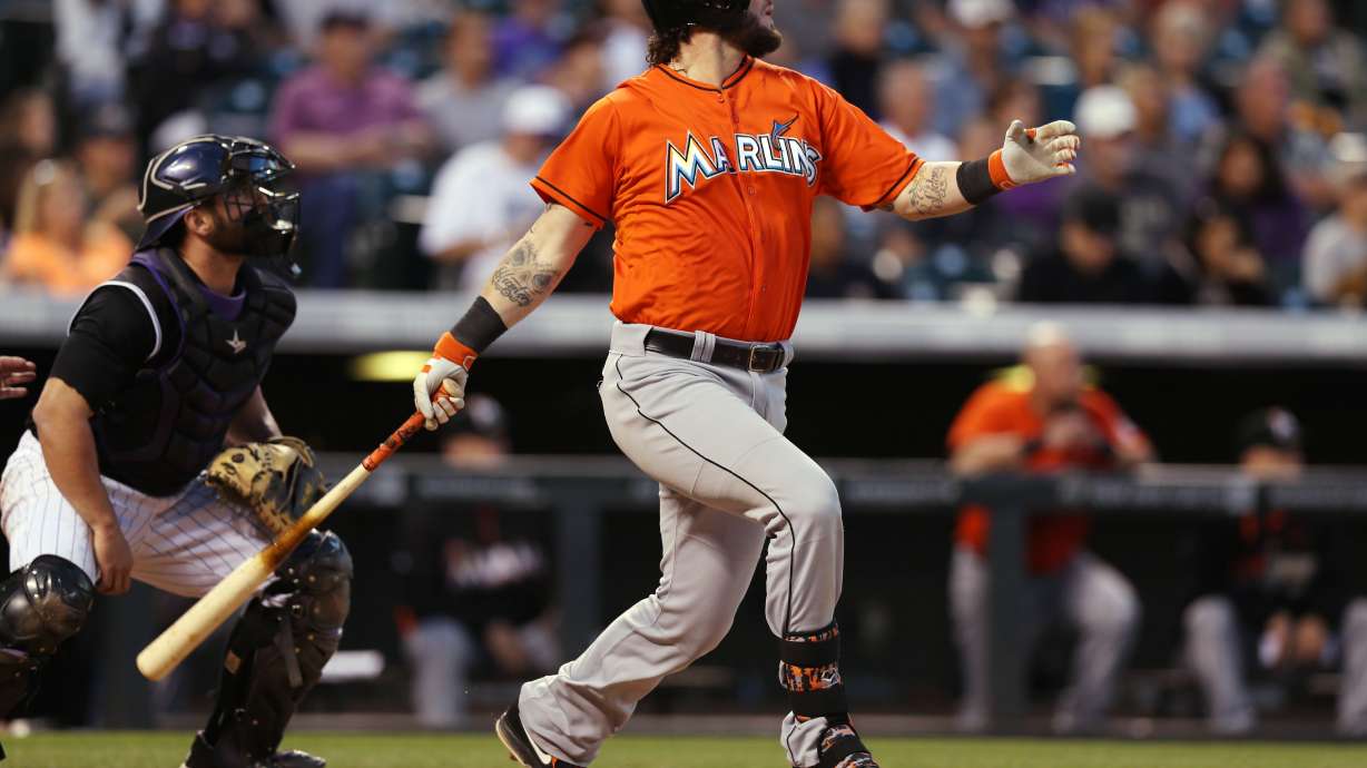 Dickerson's hit in 13th lifts Rockies past Marlins