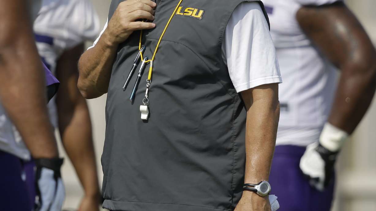 Miles says No. 13 LSU will play 2 QBs vs Wisconsin