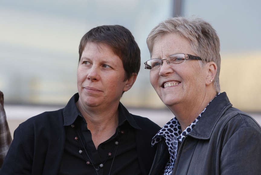 File - Plaintiff Kody Partridge and partner Laurie Wood on Monday, April 7, 2014, in Salt Lake City.