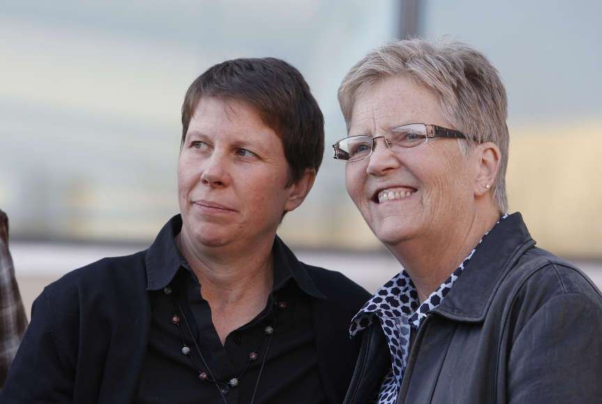 File - Plaintiff Kody Partridge and partner Laurie Wood on Monday, April 7, 2014, in Salt Lake City.