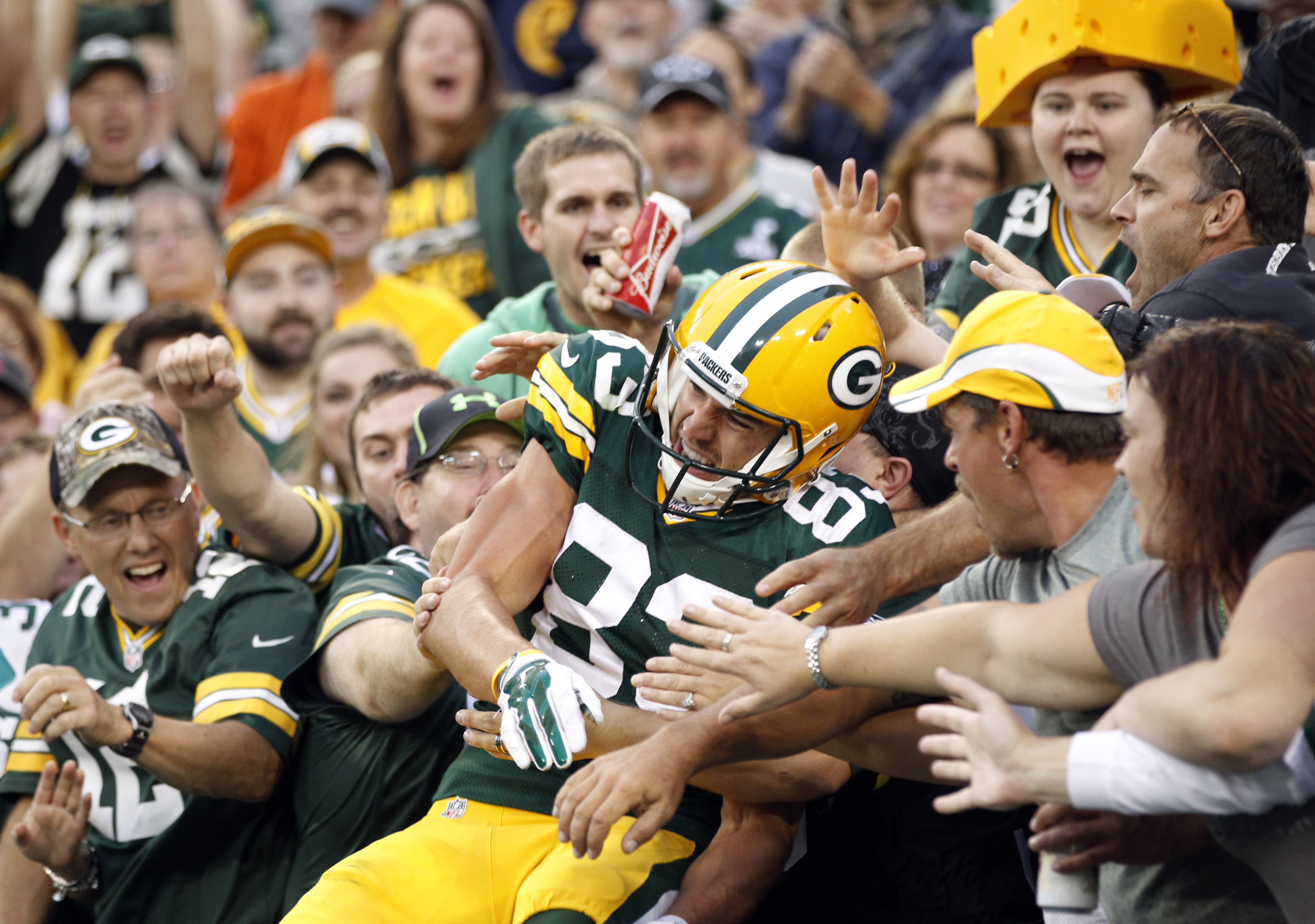 Packers rookies Janis, Elliott bolster roster bids