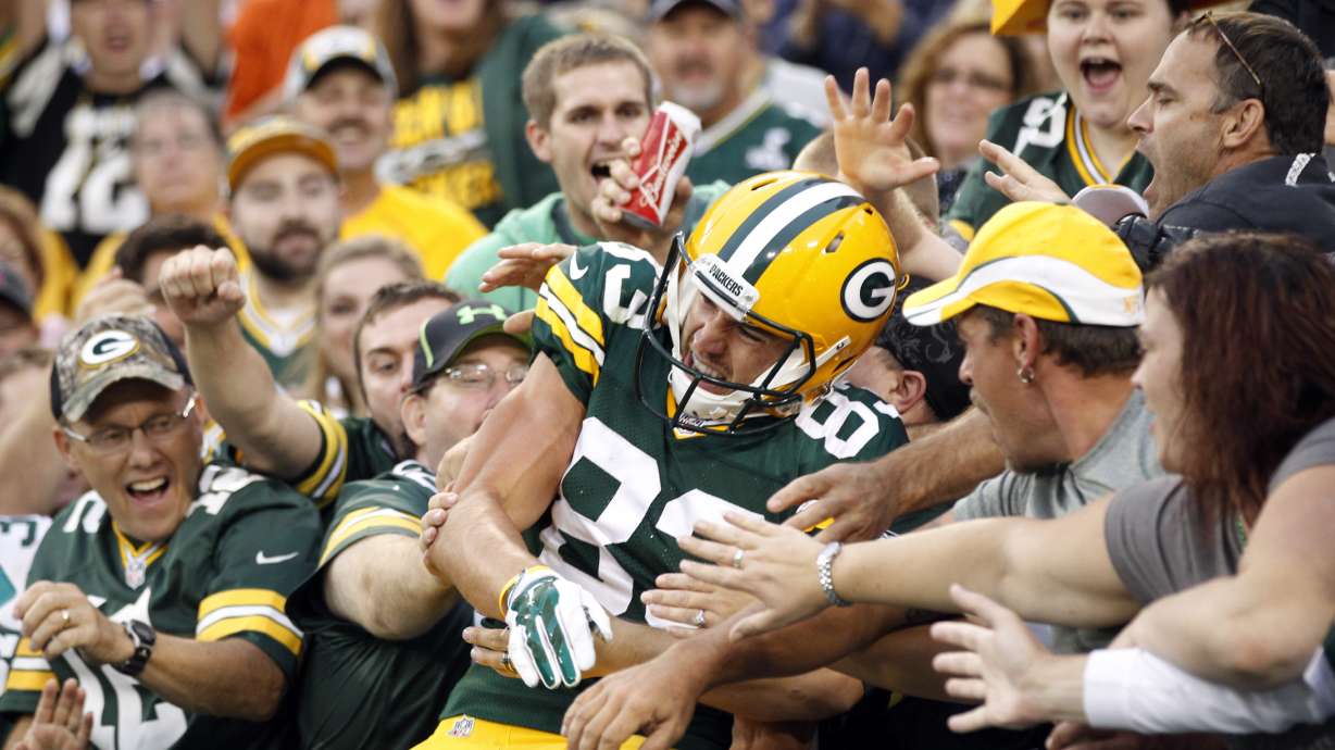 Packers rookies Janis, Elliott bolster roster bids