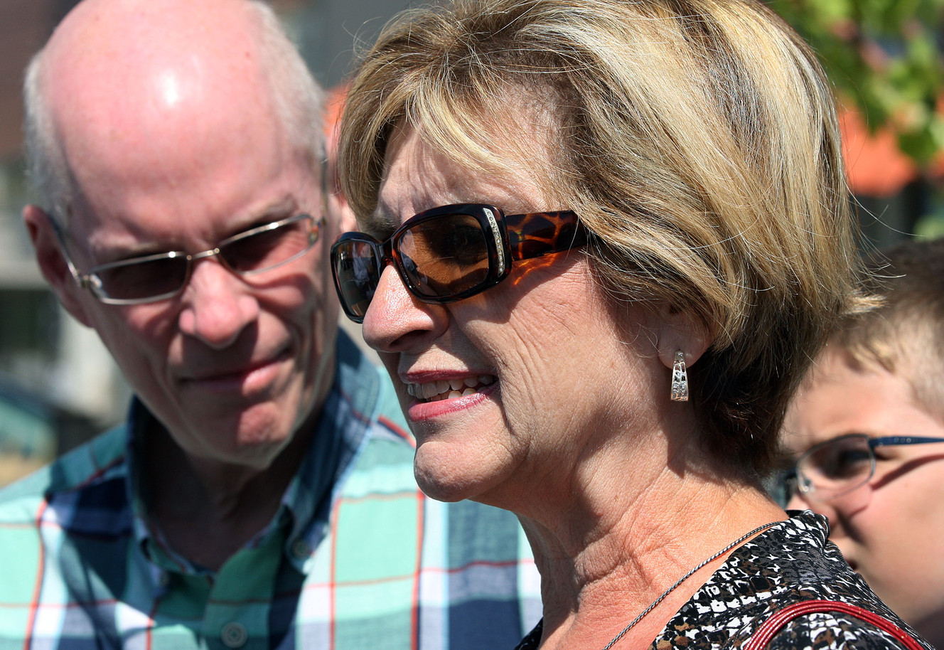 Jan Harding, a woman whose mouth and throat were burned from a sip of iced tea tainted with cleaning solution, talks with media in Salt Lake City, Friday, Aug. 29, 2014. At left is her husband, Jim Harding. (Photo: Ravell Call, Deseret News)