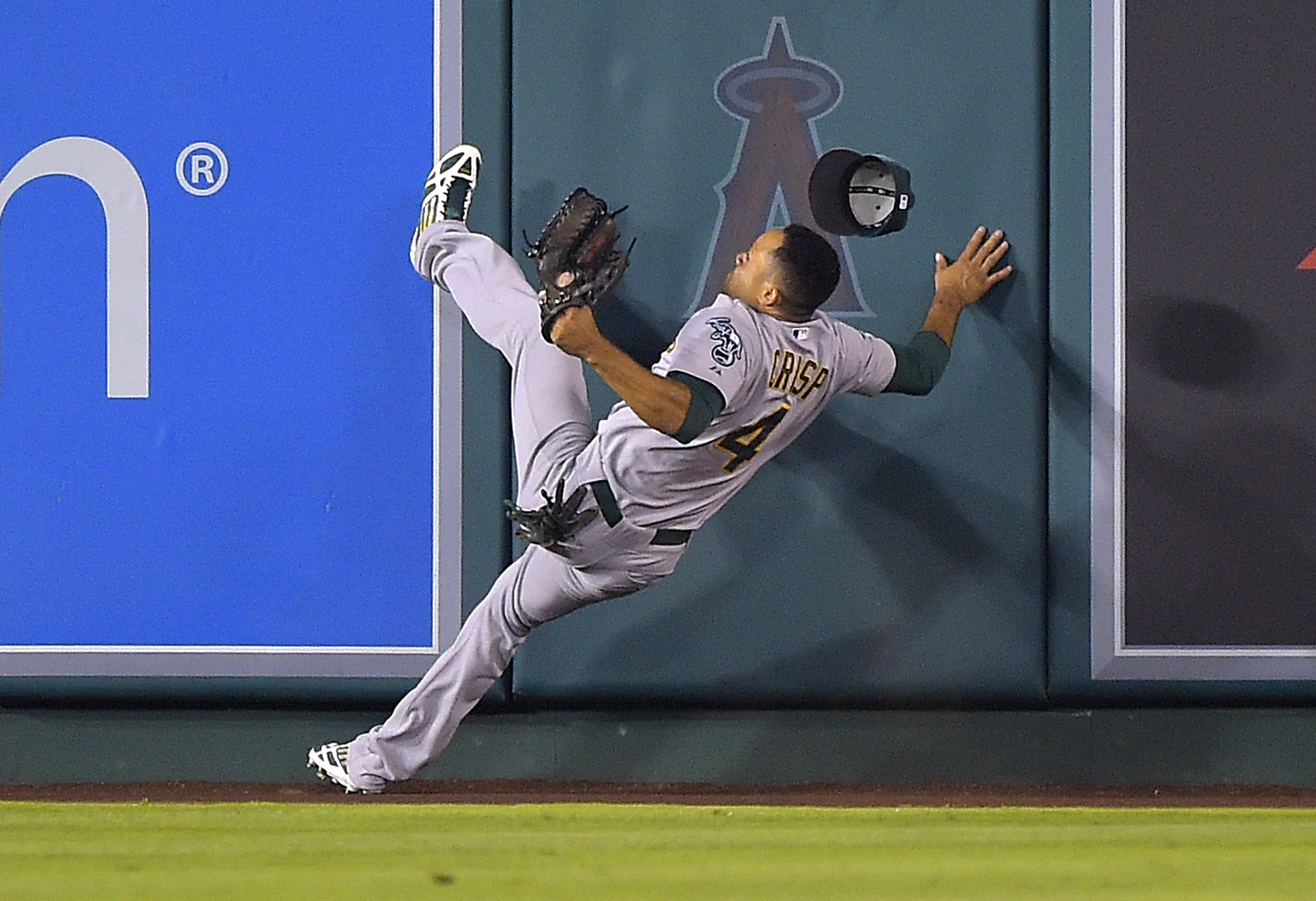 Angels beat A's 4-0 behind Weaver, up AL West edge