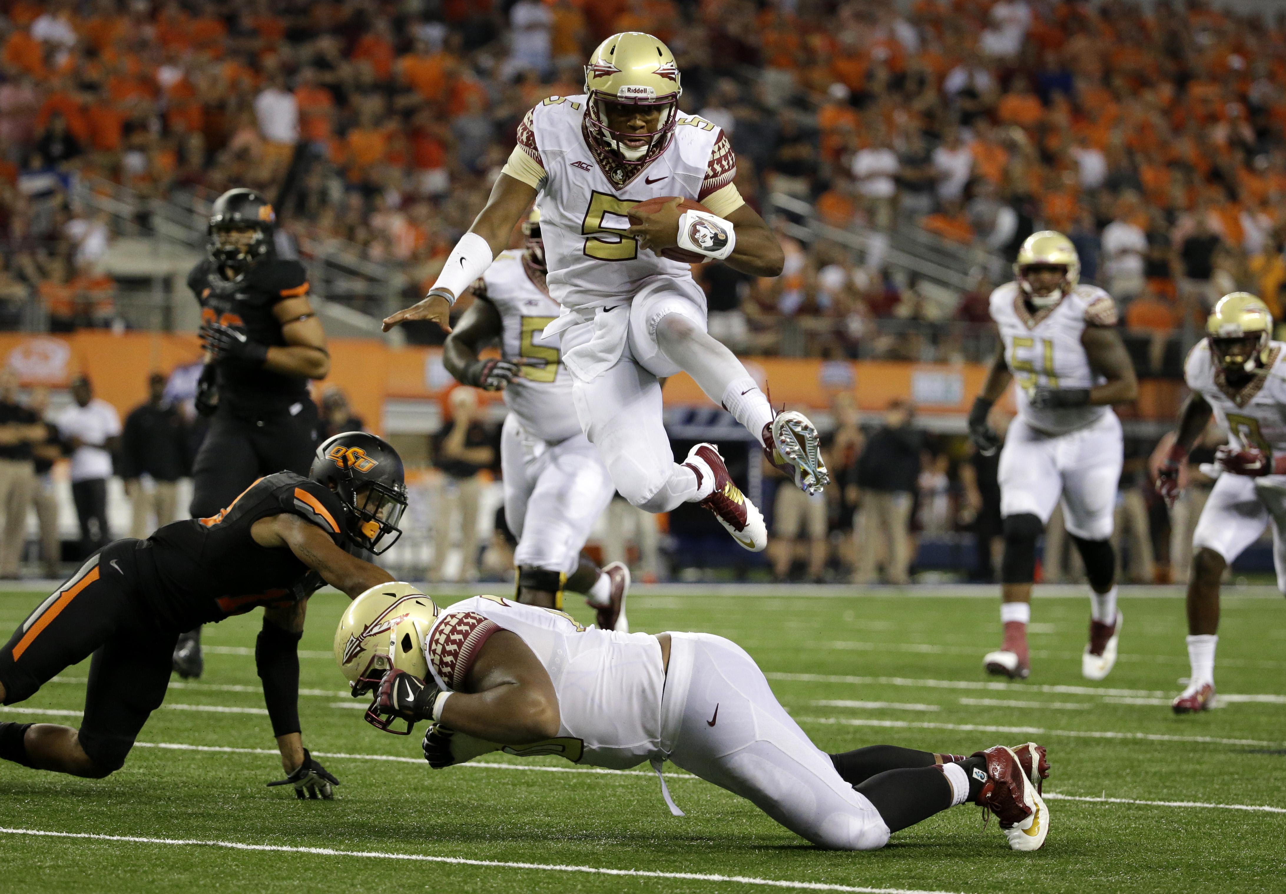 Winston, FSU hold off Oklahoma St 37-31 in opener