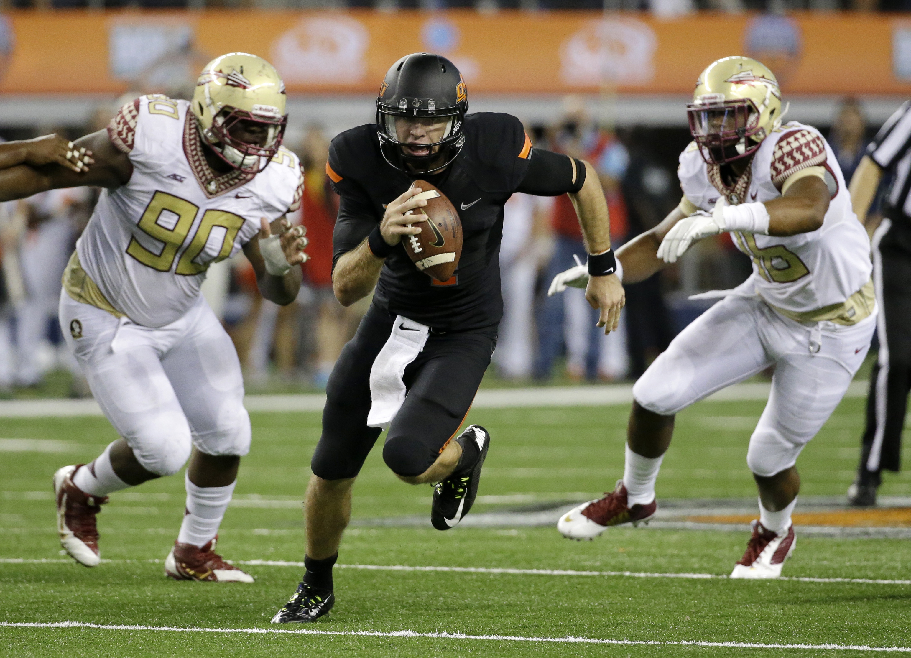 Walsh, Oklahoma State hang with FSU in 37-31 loss
