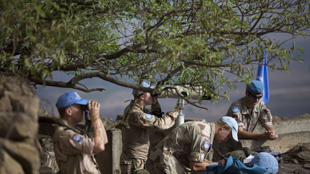 Syrian rebels, government clash in Golan Heights