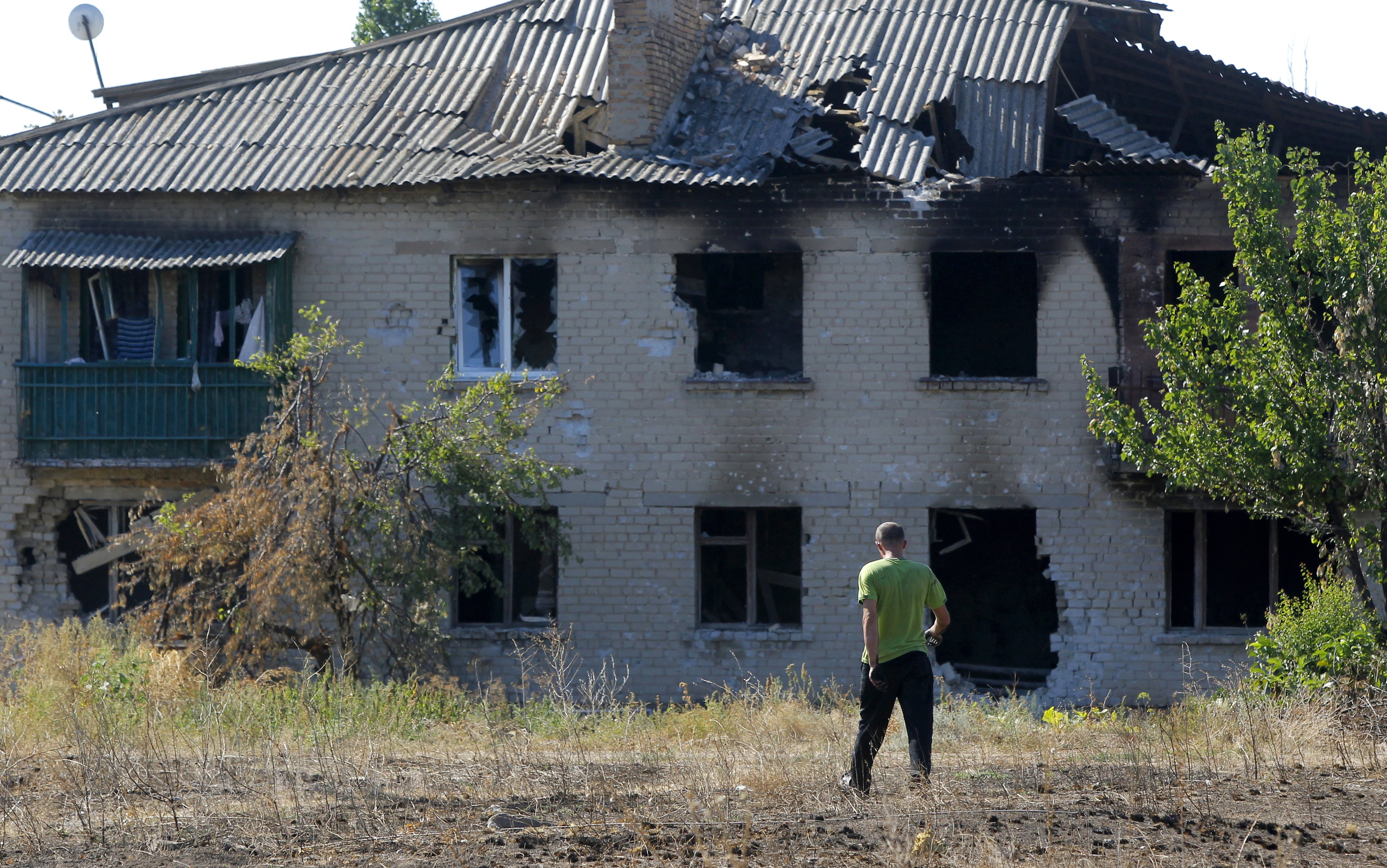 Battle-hit Ukraine village picks up the pieces