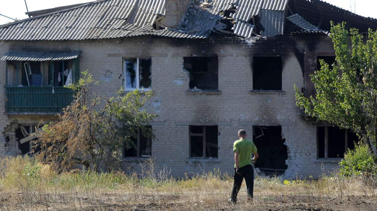 Battle-hit Ukraine village picks up the pieces