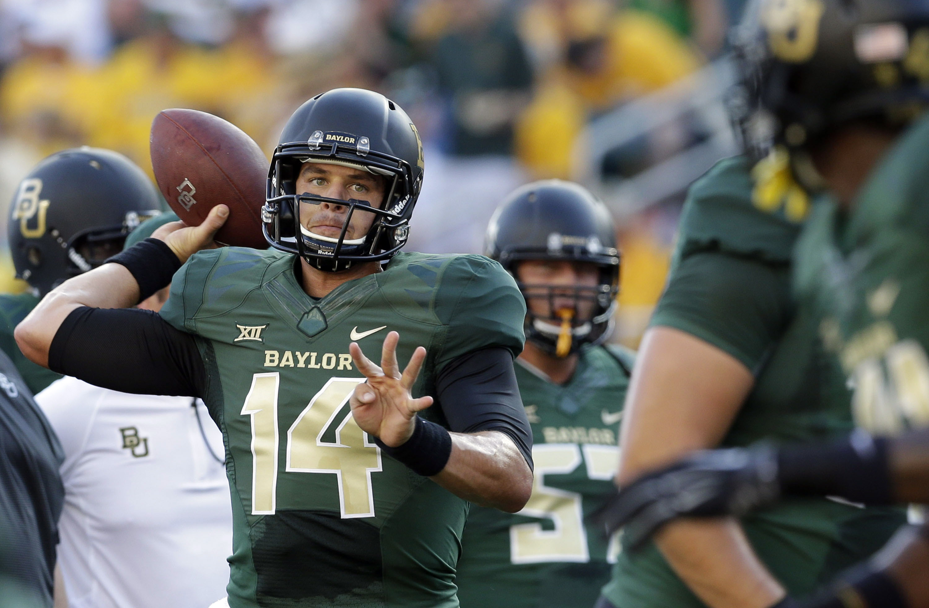 Baylor QB Petty has 2 cracked small bones in back