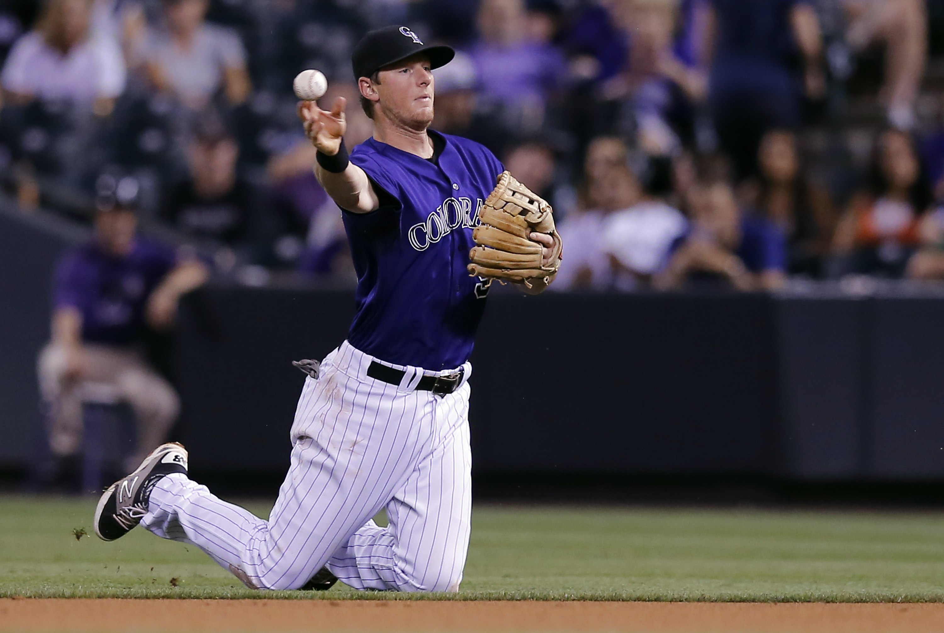Rockies blow big lead in 12-7 loss to Giants