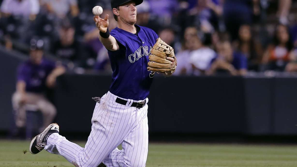 Rockies blow big lead in 12-7 loss to Giants