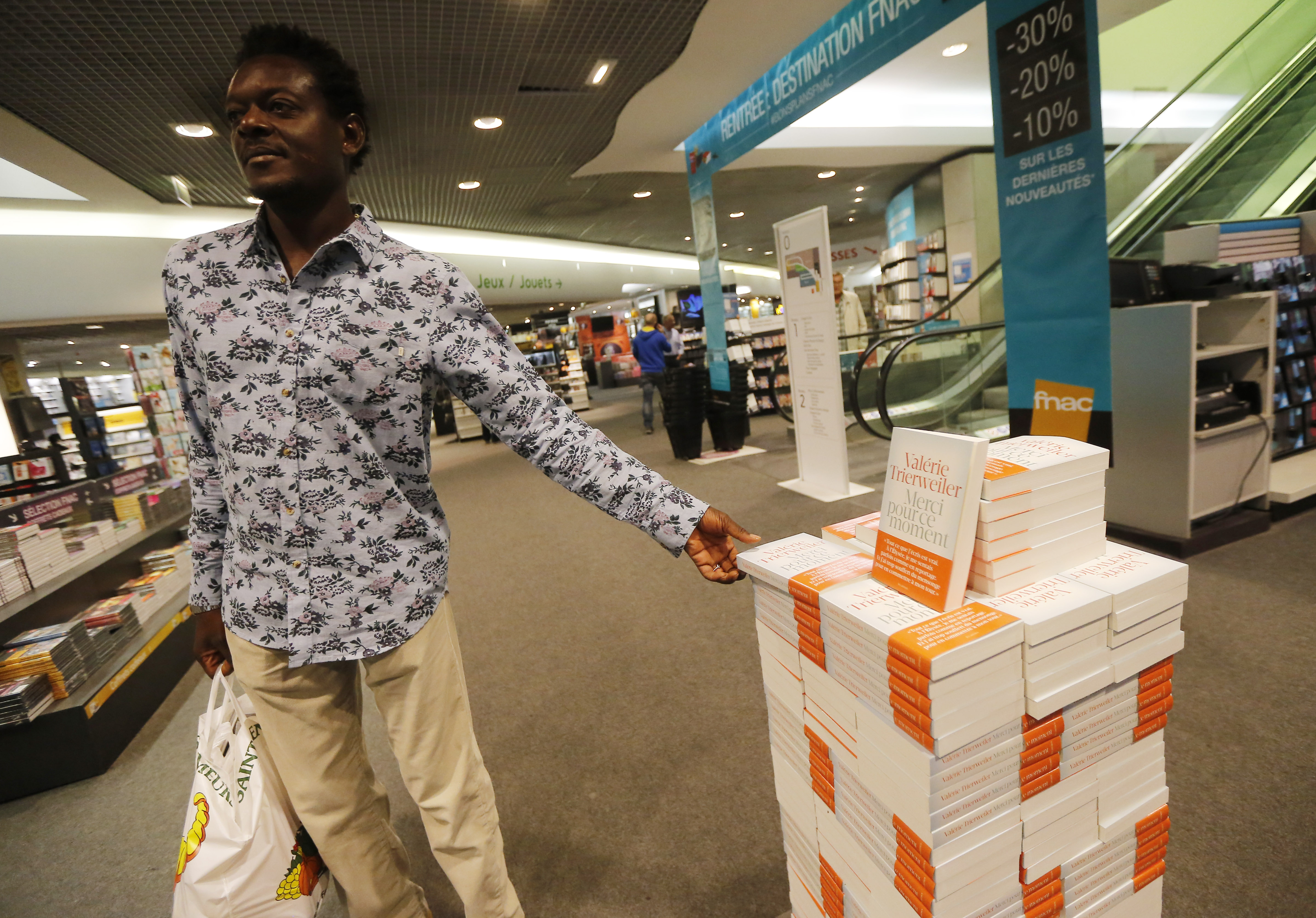 French president's ex depicts him as cruel, lying